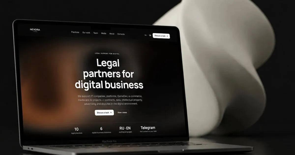 Nexora Legal — тёмная версия v2 на MacBook